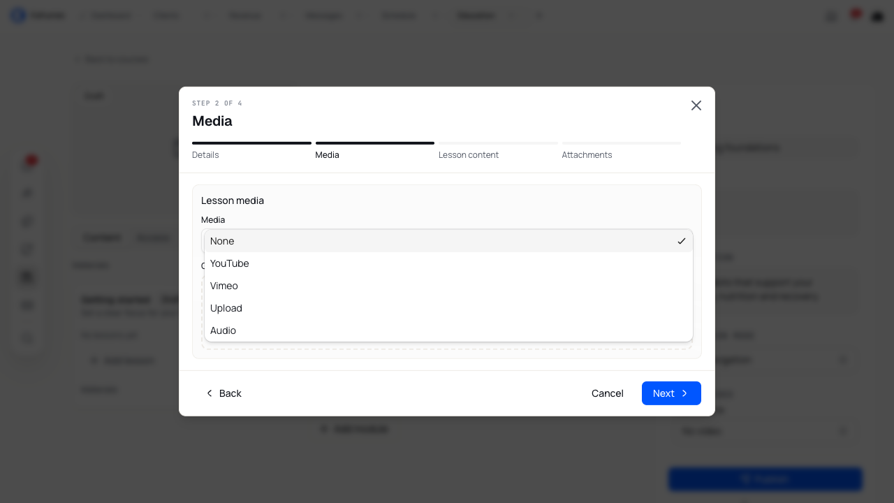 The lesson Media menu showing None, YouTube, Vimeo, Upload and Audio.