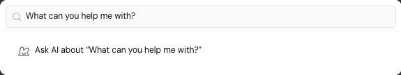 Typing a question in search offers Ask AI about "What can you help me with?".